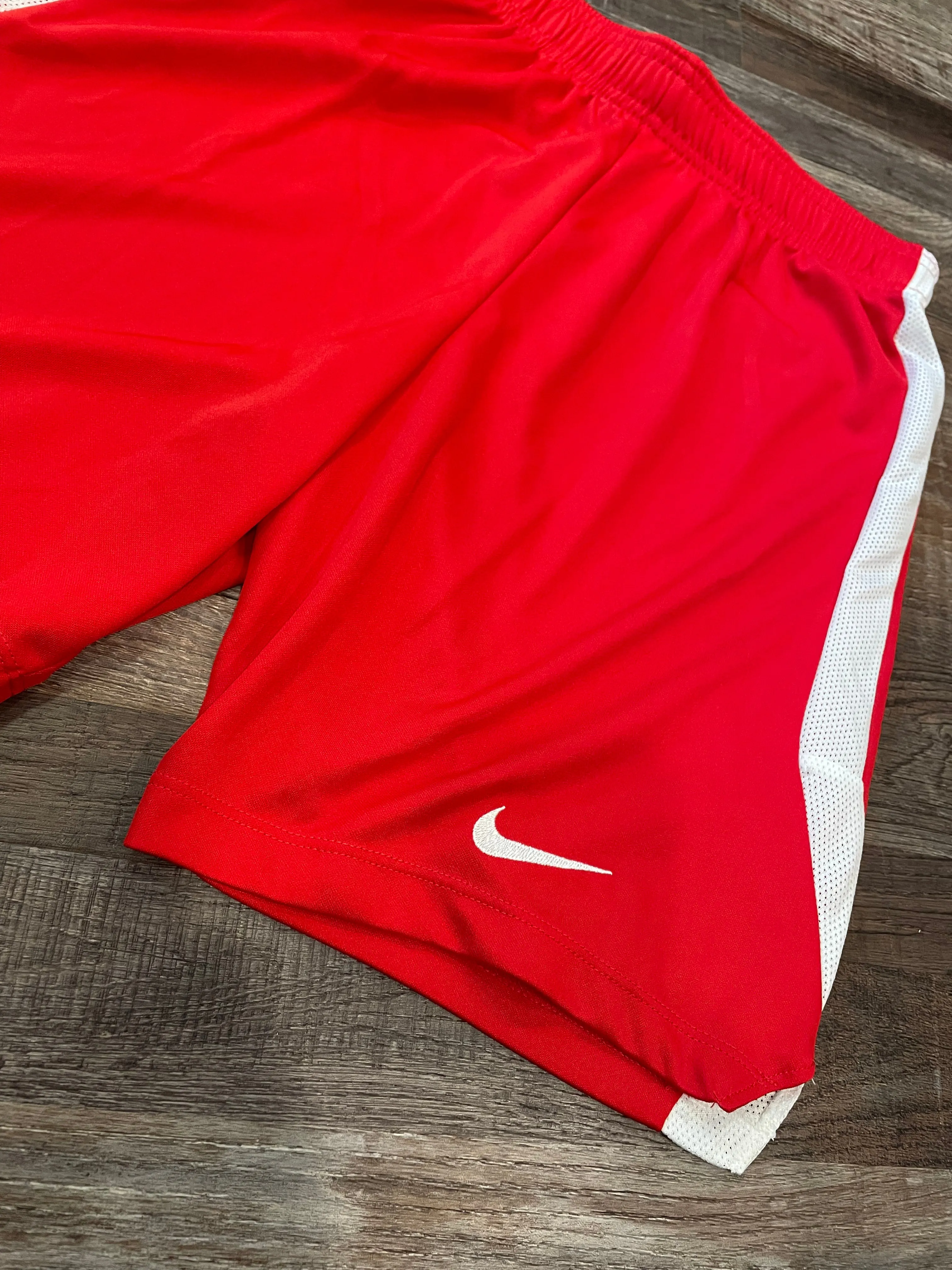 NIKE Red Shorts with white down the leg Womens 3” inseam size small